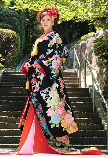 Contemporary black uchikake (wedding over-kimono) featuring lilies and birds