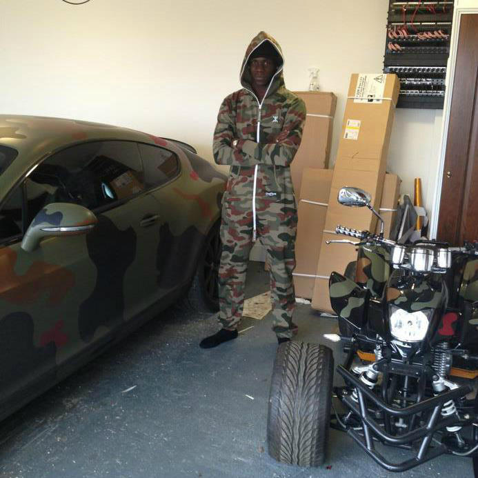 Mario Balotelli has joined twitter and he obviously wanted to show off his camo sportscar, camo ATV, and camo onesie.