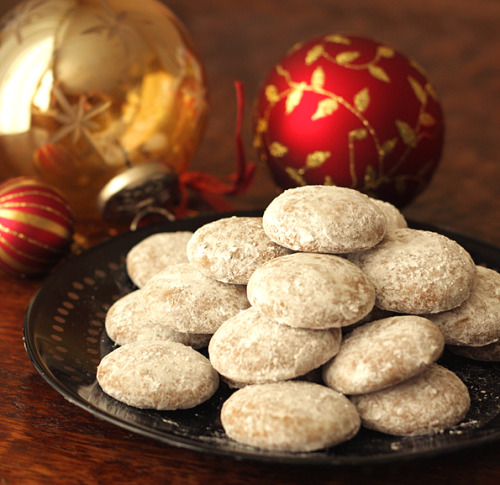 Pfeffernüsse = pepper nuts are small, firm and round cookies that are popular in the holiday season.