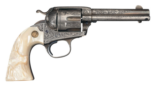 pimpingweapons:Single Action Colt Bisley, with factory engraving and pearl grips.