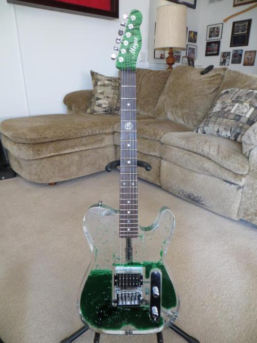 runfromrevelation:  This fascinating creation came to my attention a few days ago, while reading the december issue of guitarist. This is a Meyer Guitars Telecaster built for John5. The body is clear plastic, most likely some form of chambered acrylic