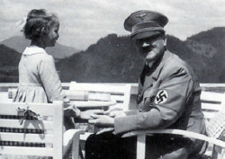 ramirezbundydahmer:  Adolf Hitler with Bernile Nienau, a young girl who was introduced to him as they both shared the same birthday.  Bernile Nienau was the apple to his eye, even inviting her and her mother to spend time at his home after finding