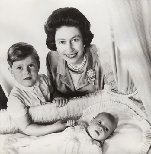 Prince Andrew, Queen Elizabeth II and Prince EdwardBy Cecil BeatonBromide print on white card mount,