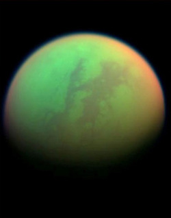 stellar-indulgence:  Saturn’s moon Titan has hundreds of times more liquid hydrocarbons than all the known oil and natural gas reserves on Earth, according to data from NASA’s Cassini spacecraft. The hydrocarbons rain from the sky, collecting in vast