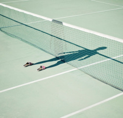 showslow:  I’m Not There by Pol Ubeda Hervas   is a series of images that displays a man looking at his shadow. The only thing is that the man has been removed from the pictures and all that is left is a pair of sneakers and a reflective dark shape.