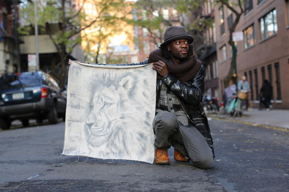 humansofnewyork:  This man was walking down the sidewalk with a rolled-up canvas