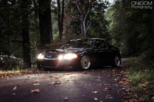rastamonstaaa:  Friend Cody’s supercharged GSR Del-Sol. #lowlife