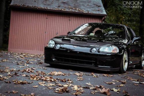 rastamonstaaa:  Friend Cody’s supercharged GSR Del-Sol. #lowlife