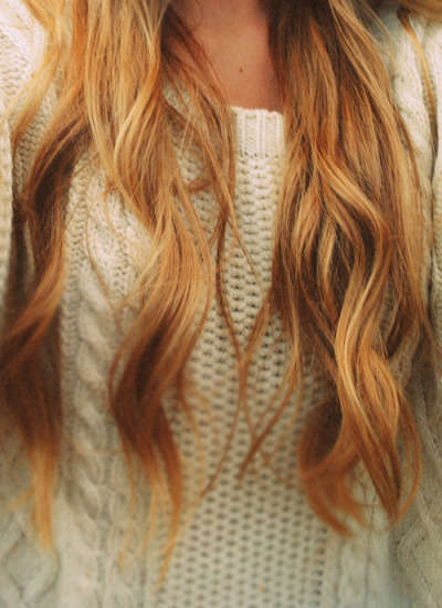 Honey blonde curly hair