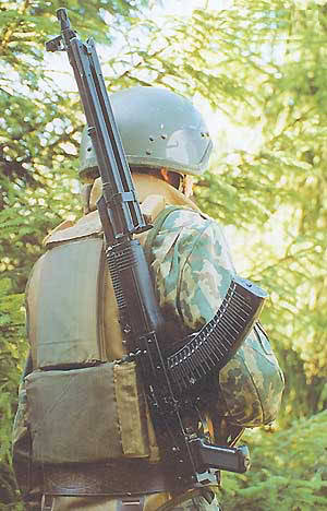 RPK-74MA Russian soldier with the RPK-74M, a side-folding stock version chambered in 5.45x39mm. Note