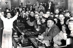 Collective-History:  On This Day, Seventy-Nine Years Ago, Citizens In A Bar Celebrate