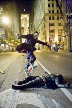 popixima:  Heath Ledger as the Joker skate boarding over Christian Bale as Batman while they take a break on the set of The dark knight.  Is this for real?