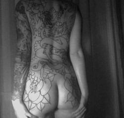 ifyourewilling:  this is an awful picture but we finished the outline of my back piece today! this piece is done by landon lewis.  