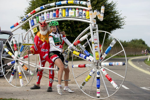 procycling:  The famous Tour de France cycling devil with one of his bike creations.