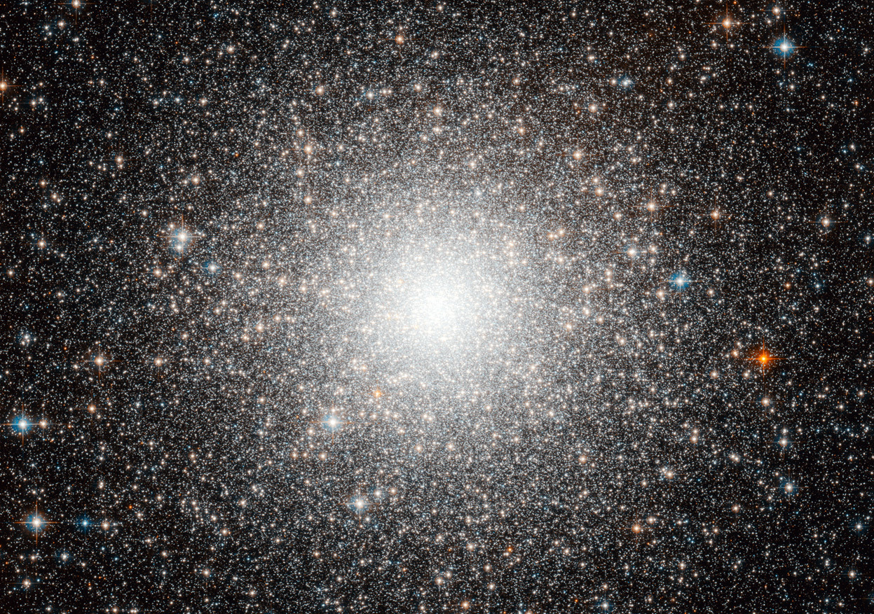 Day 7 of the 2012 Hubble Space Telescope Advent Calendar, one of 25 photos (eventually). This object, known as Messier 54, could be just another globular cluster, but this dense and faint group of stars was in fact the first globular cluster found...