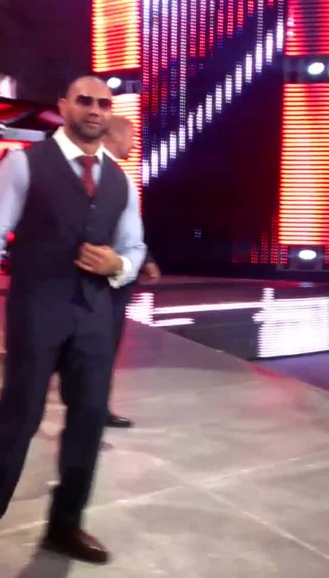 rwfan11:  welcome2my-playhouse:  BATISTA making fun of the guy next to me challenging him to get in the ring Batista said ” u get ur fat ass in the ring Lmao  ….this is too funny! ….oh Batista, you sexy jerk! LOL! :-)