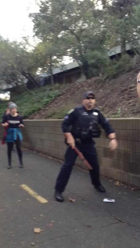 chocho-akimichi:  bestpal:  Police in Davis, CA during a protest against police brutality and the murders of Eric Garner and Mike Brown  “it’s not a black issue it’s a human issue"………………..anyways………