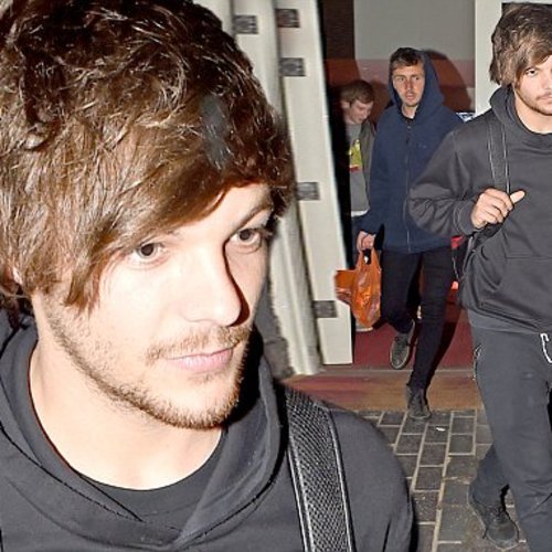 One Direction's Louis Tomlinson with a suspicious 'cigarette