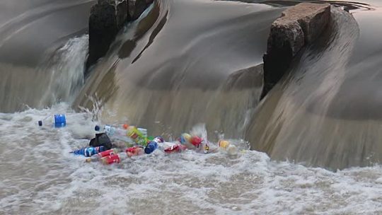 Trash in a stream.