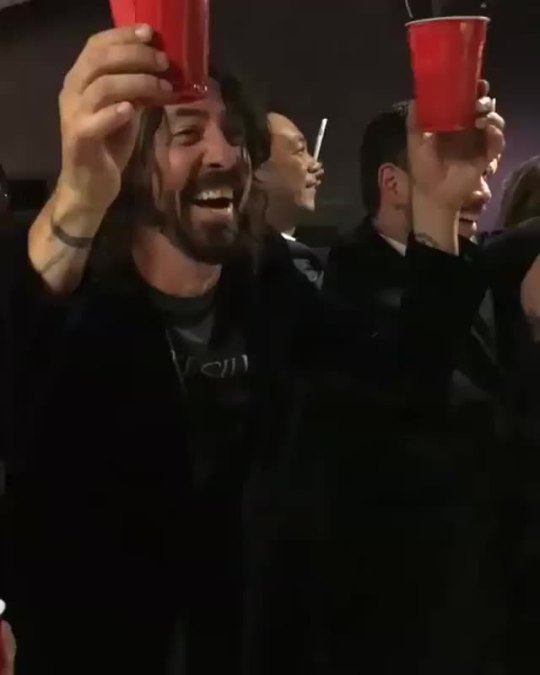 gagafanbasedotcom:  Lady Gaga and Dave Grohl (Foo Fighters) toasting on Oscars backstage. (02/28) 