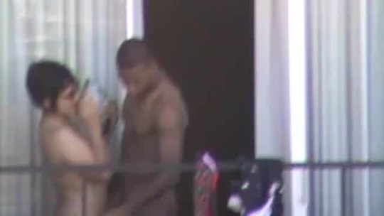 nakedonthebalcony:  Black & White couple 1 I never know who enjoys this more, the exhibitionist or the voyeur.Please let me know what you think of my home movie.Thanks,streetnaked@hotmail.com