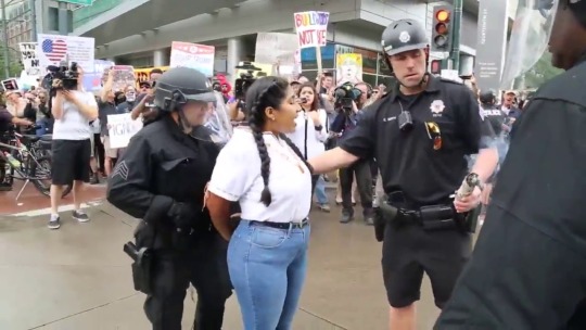 poesdaughter:  awnex:  sandyliliana:  zerosuit:  thetrippytrip:    Native Woman JosieVF Arrested for Burning Sage in Denver CO at Trump Rally.  Ironically the cop arresting her had chewing tobacco in his mouth. Native to Americas, but she can’t burn