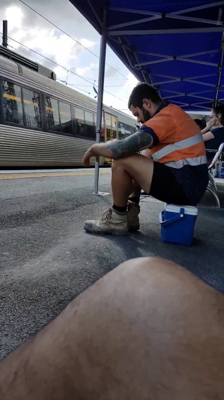 brisfob: Hot muscled tradie… shaved legs trying to get a tan. #southbank #brisbane #trainstation