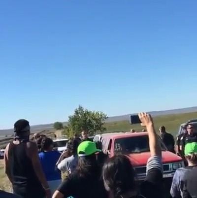 blacktivist–yaanii:  cartnsncreal:  lagonegirl:  4mysquad:   Peaceful Dakota pipeline protesters have tear gas from plane sprayed on them, a tank and a high frequency weapon used against them.     If the protesters are peaceful it is the job of law