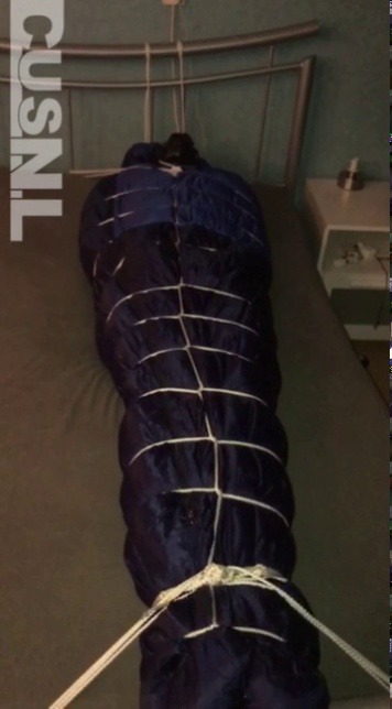 mummybagboy: photosofcusnl: I was tightly bound into a thick winter overall and 2 mummy sleeping bags. :). Loved it.  I want this done to me to bake in down. 