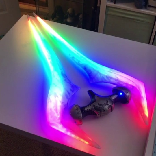 riolas32:  keranos-god-of-storm-crows:  hydraworx: My friends made us a Halo Energy Sword as a (belated) wedding gift. I am cry, it’s so beautiful.Sword and concept by Sean Bradley Studio, electronics kit by Josh Kane. I always knew that Halo was a