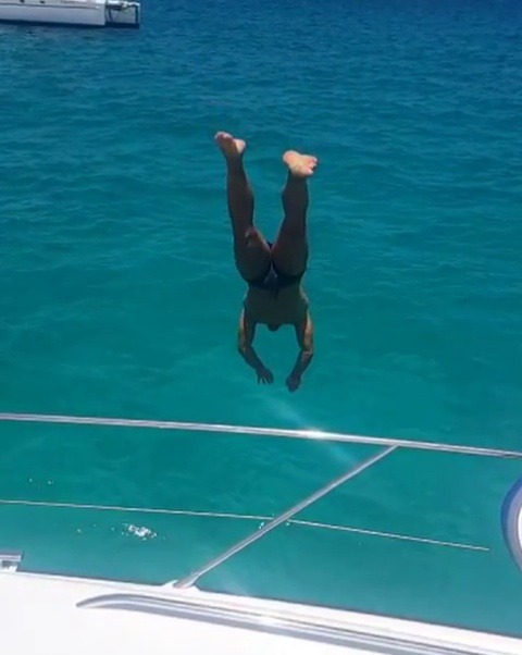 go-pumas:  Jumping off a perfectly good boat into maybe Shark infested waters? Well