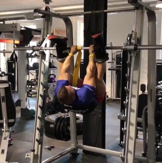 Karol Malecki - Doing Some Hanging Ab Raises.