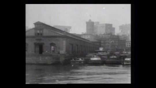 onceuponatown:   Panorama water front and Brooklyn Bridge from East River. New York City, 1903.   This film depicts the East River shoreline and the piers of lower Manhattan starting at about Pier 5 (the New York Central Pier) opposite Broad Street,