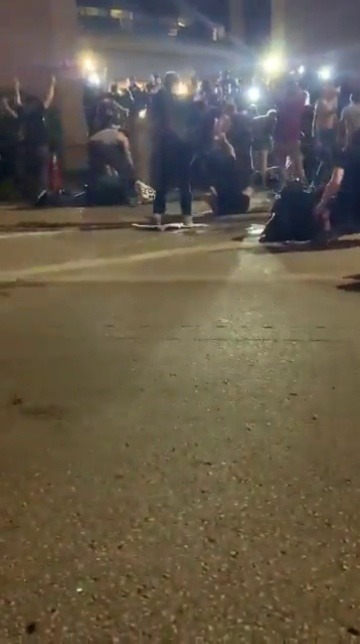 krxs100:  *************** ATTENTION *************** Video captured of peaceful protester Justin Howell being carried unconscious after sociopath police officers shot several bullets, hitting him in the head. Police tell protesters to bring him to them