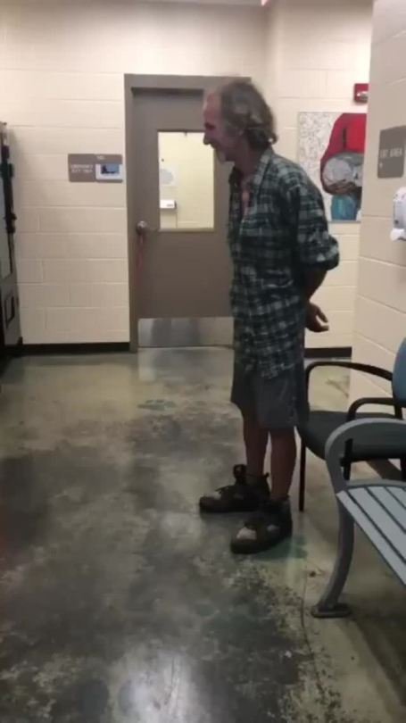 Man reunited with his dog (Source)