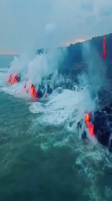 bonez0318:sixpenceee:   Magma flowing into the Pacific Ocean, Hawaii | Source                                 Great footage 