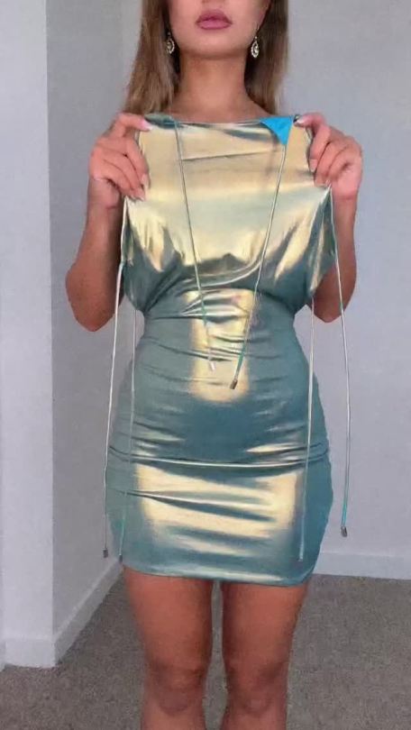 sexysilkysatin:So kind of her to lets us watch her get dressed for her night out in this gorgeous slinky mini dress.  She looks so beautiful   