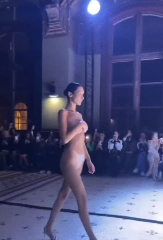 divineparadisos:bella hadid closing coperni s/s 2023 in a spray-on dress created