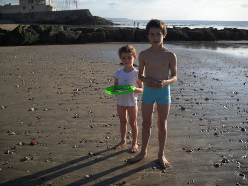 photodreams:  older brother and younger sister collecting crabs at the beach Moi: “Bonjour. Est-ce que je peux prendre un photo de toi et tes crabs? Les enfants: “Oui! Et est-ce que tu veux un crab? Nous avons beaucoup des crabs. Moi: “Non, ca